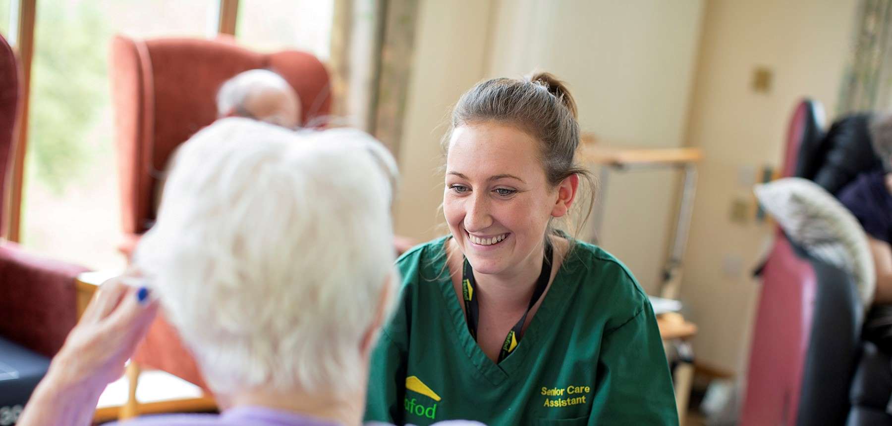 Hafod carer speaking with a resident